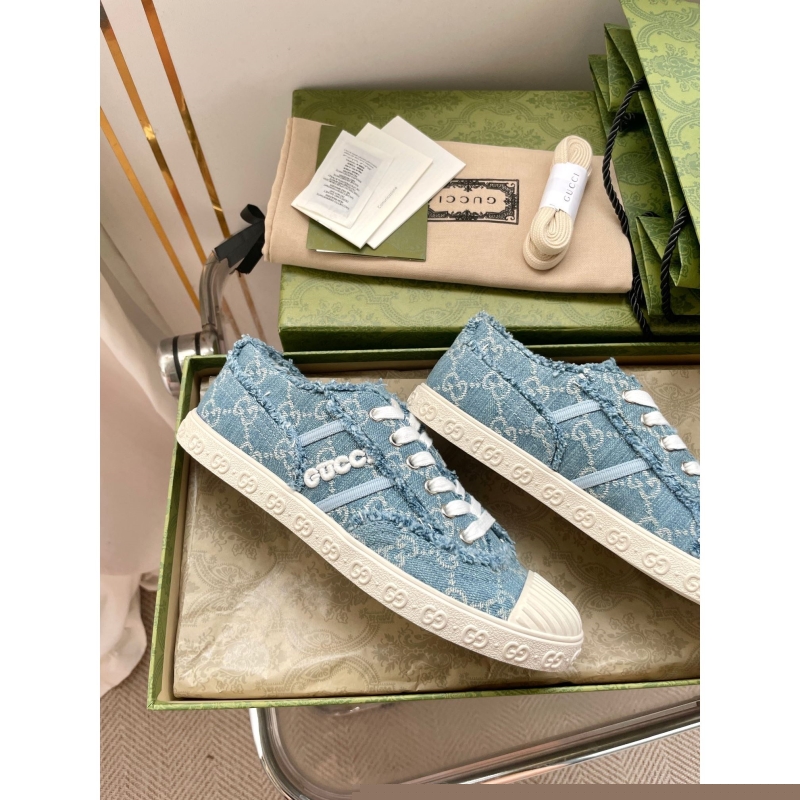 G*u*i sneakers